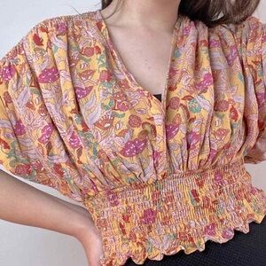Cupcakes & Cashmere Gold Floral Smock Waist Top